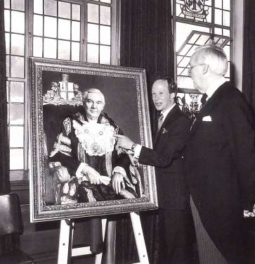 A photograph of he official unveiling of a portrait of Sir Allan Davis