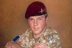 A portrait of a soldier back from Helmand
