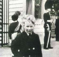 A photograph of Richard aged four outside Buckingham Palace