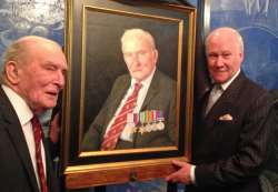 A photograph of Johnny Johnson at his official Portrait unveiling
