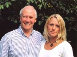 A photograph of Richard Stone with his daughter Flavia at 24